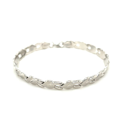 14k White Gold Heart Shape Textured Bracelet (6.35 mm) 
