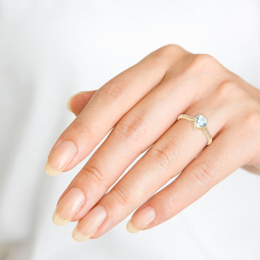 Engagement Ring in 14K Yellow Gold with Heart Shape Aquamarine and 18 Round White Diamonds 