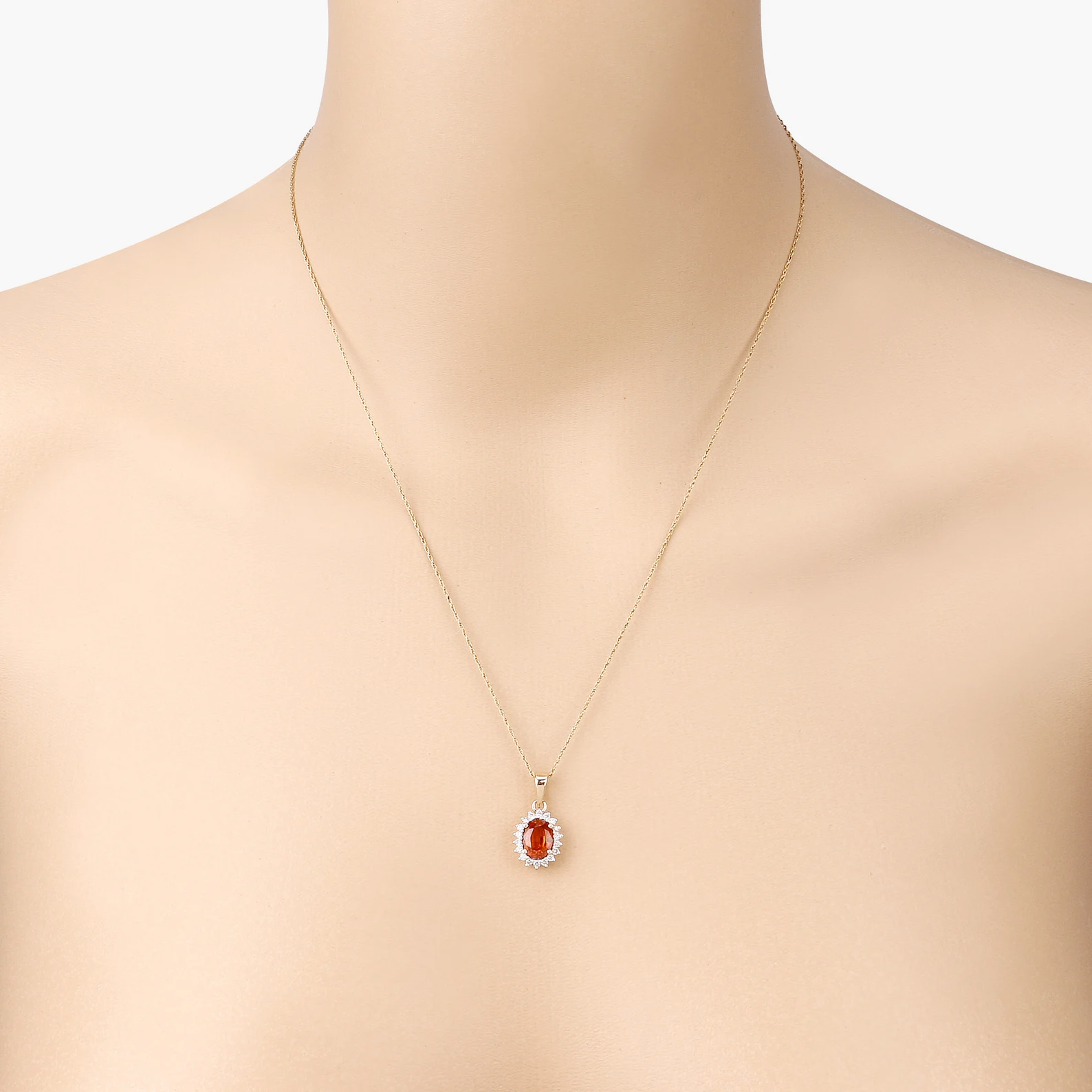 Halo Oval Spessartite Garnet and 18 Round White Diamonds in 14K Yellow Gold 