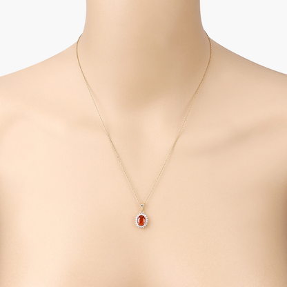 Halo Oval Spessartite Garnet and 18 Round White Diamonds in 14K Yellow Gold 