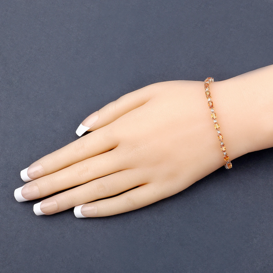 Tennis Bracelet in 14K Yellow Gold with Orange Sapphire and Diamonds 